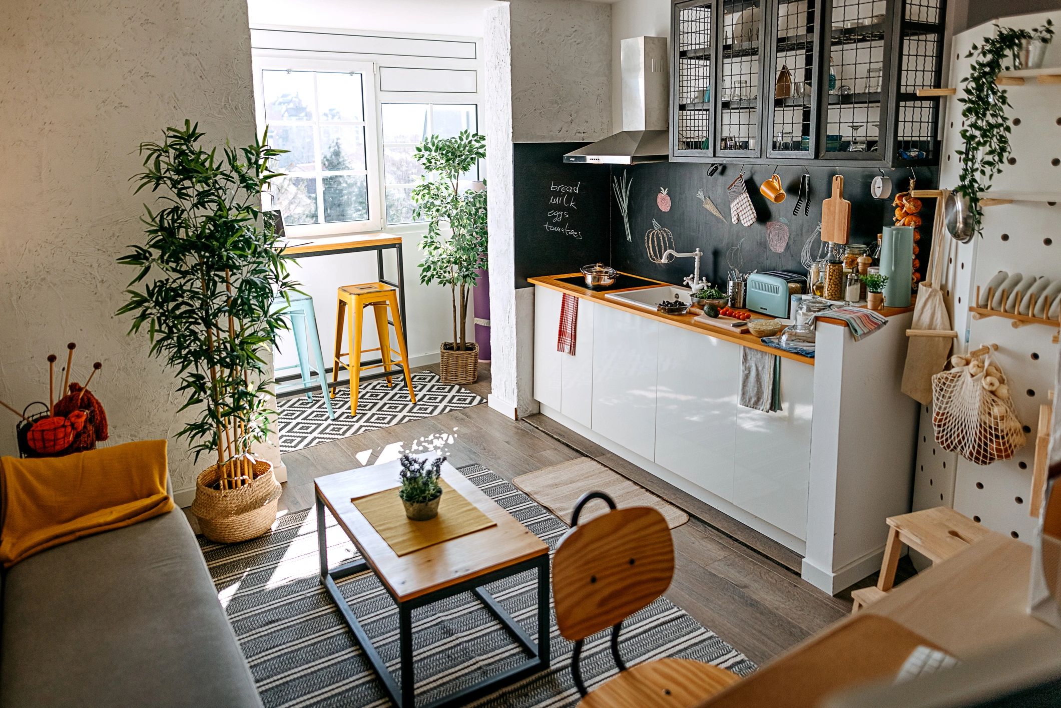 Community of small houses with shared green space and garden plots.